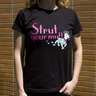 woman wearing a black tee shirt that says strut your mutt